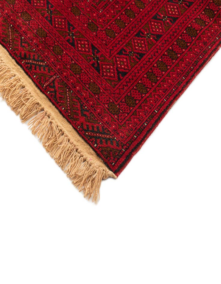 Detail image of  4' 2 x 6' 7  Hand Knotted Afghan Akhche Wool Rug