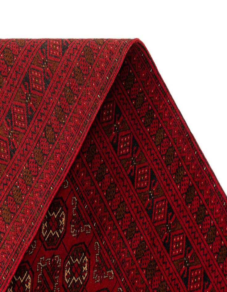 Detail image of  4' 2 x 6' 7  Hand Knotted Afghan Akhche Wool Rug