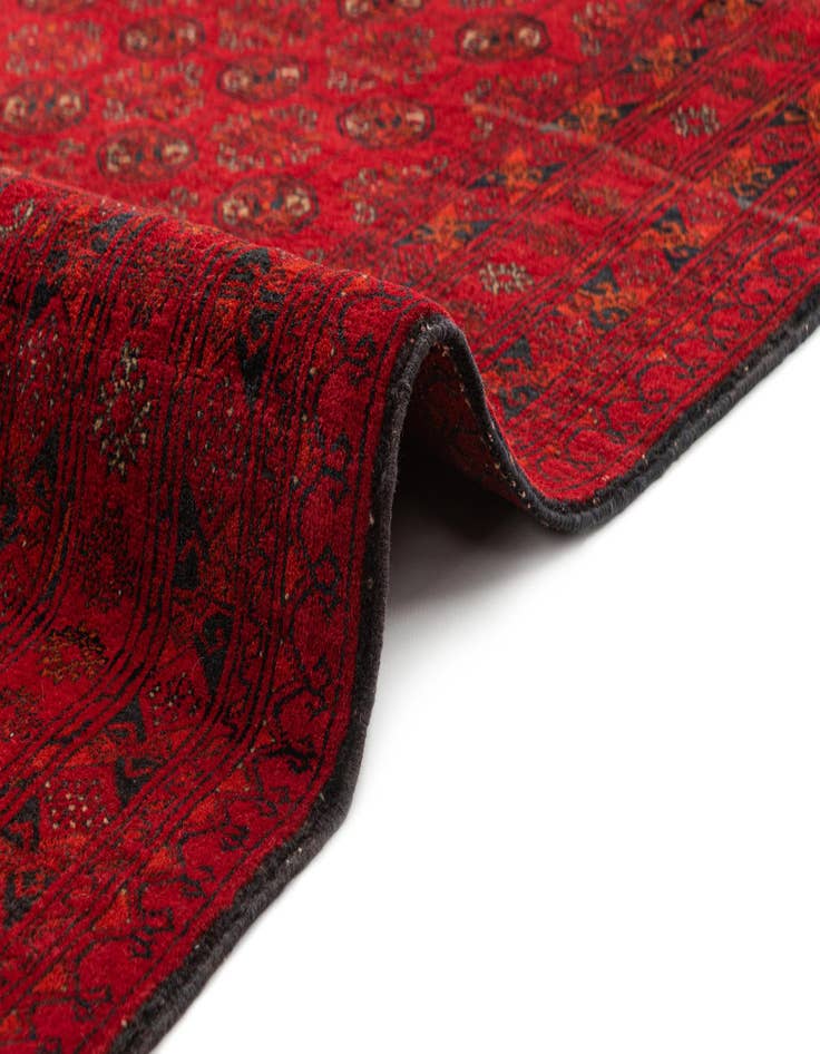 Detail image of  4' 1 x 5' 10  Hand Knotted Afghan Akhche Wool Rug