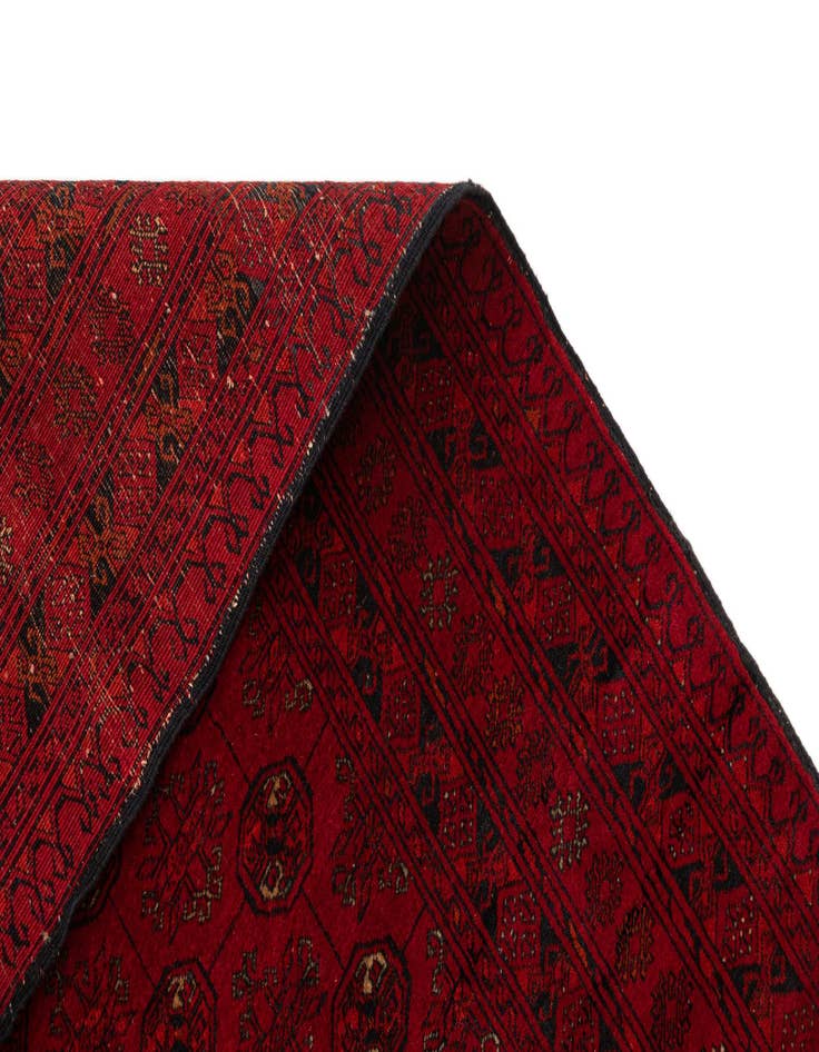 Detail image of  4' 1 x 5' 10  Hand Knotted Afghan Akhche Wool Rug