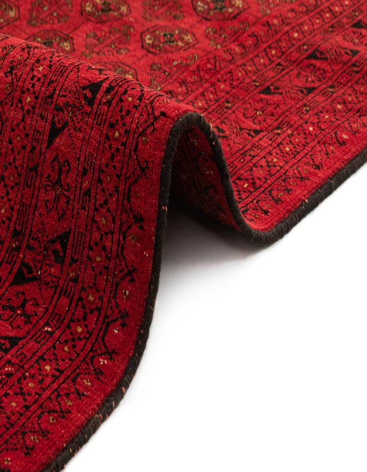 Detail image of  4' 1 x 6' 6  Hand Knotted Afghan Akhche Wool Rug