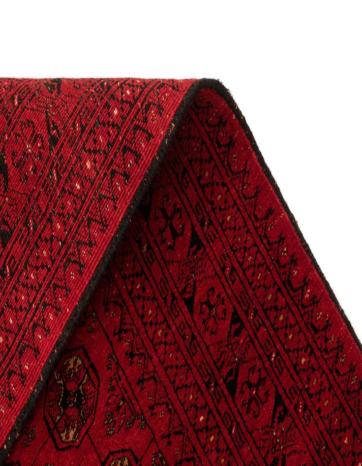 Detail image of  4' 1 x 6' 6  Hand Knotted Afghan Akhche Wool Rug