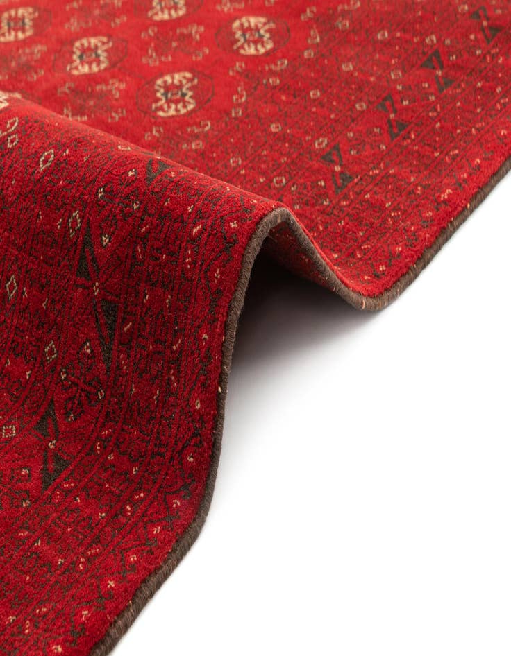 Detail image of  4' 3 x 6' 5  Hand Knotted Afghan Akhche Wool Rug