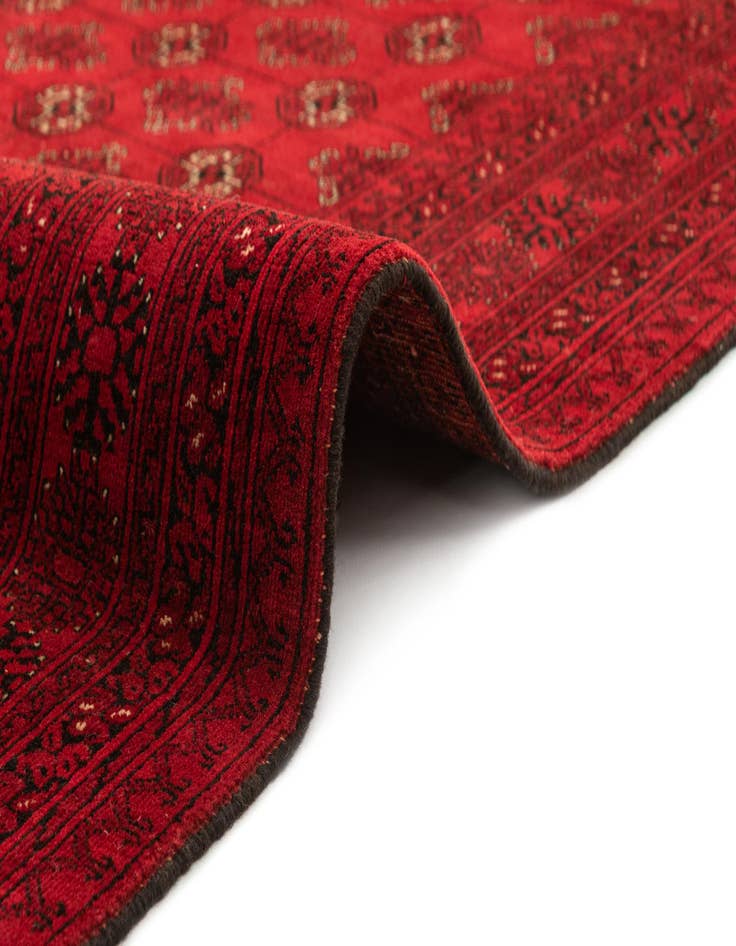 Detail image of  4' 2 x 6' 6  Hand Knotted Afghan Akhche Wool Rug