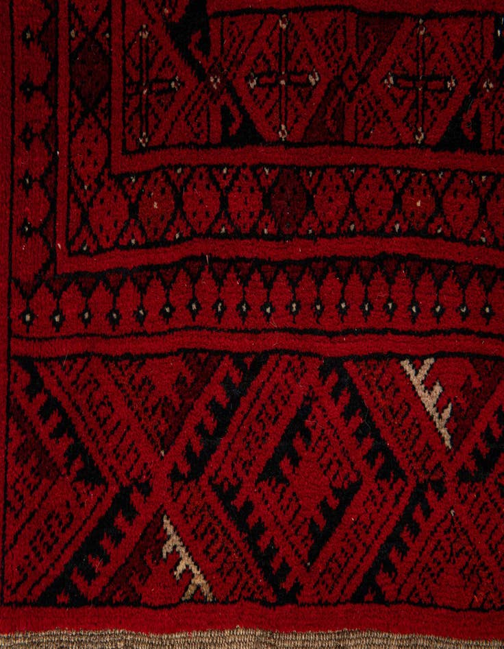 Detail image of  4' 2 x 6' 5  Hand Knotted Afghan Akhche Wool Rug