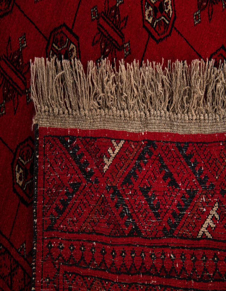 Detail image of  4' 2 x 6' 5  Hand Knotted Afghan Akhche Wool Rug