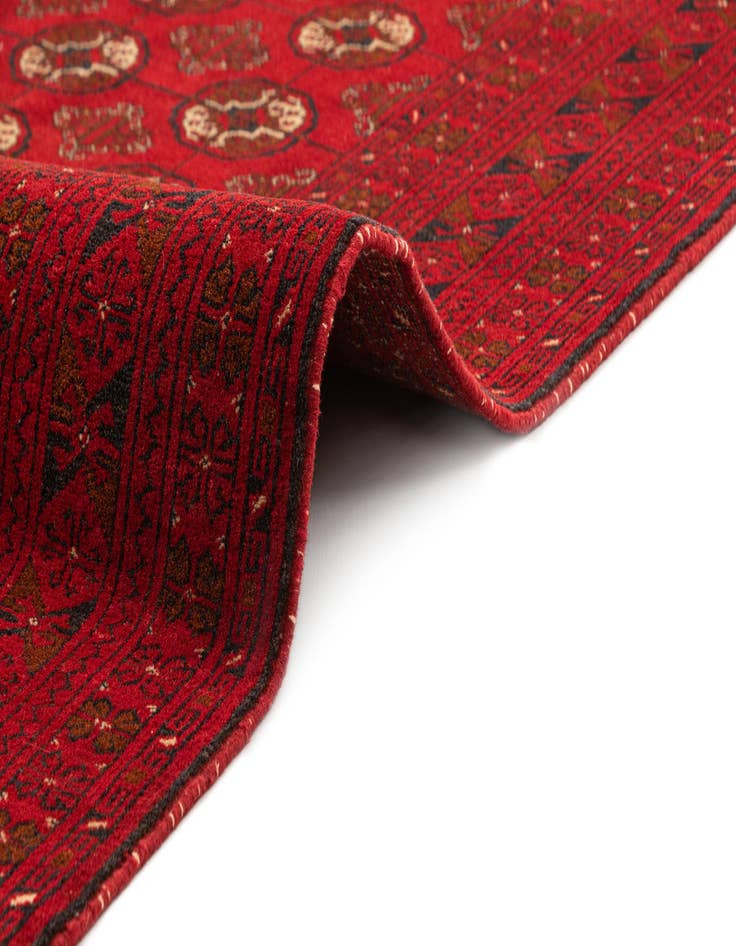 Detail image of  4' 2 x 6' 2  Hand Knotted Afghan Akhche Wool Rug