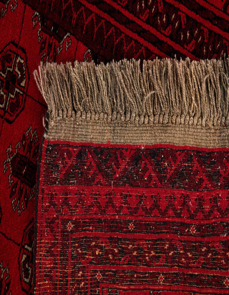 Detail image of  4' 2 x 6' 2  Hand Knotted Afghan Akhche Wool Rug