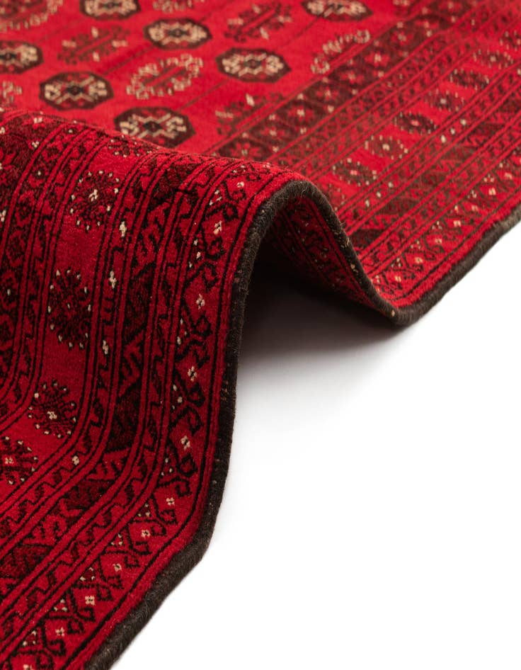 Detail image of  4' 1 x 6' 3  Hand Knotted Afghan Akhche Wool Rug