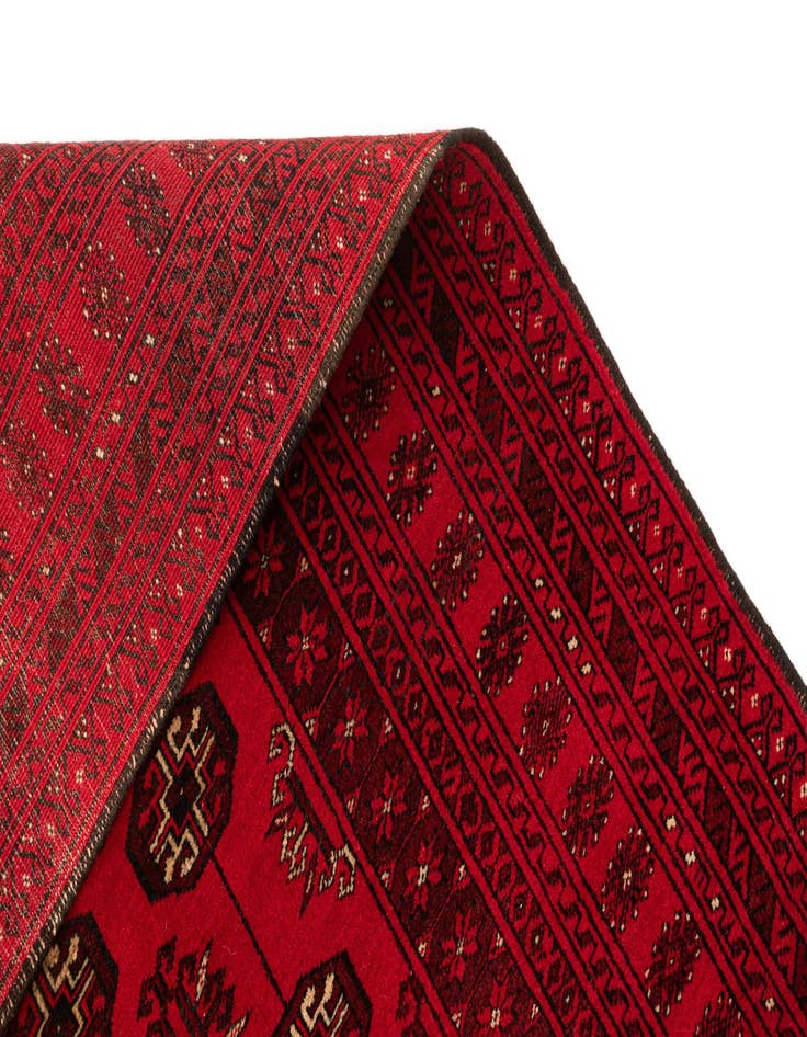 Detail image of  4' 1 x 6' 3  Hand Knotted Afghan Akhche Wool Rug