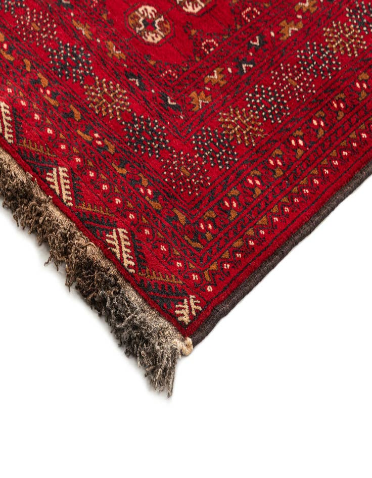 Detail image of  4' 1 x 6' 4  Hand Knotted Afghan Akhche Wool Rug