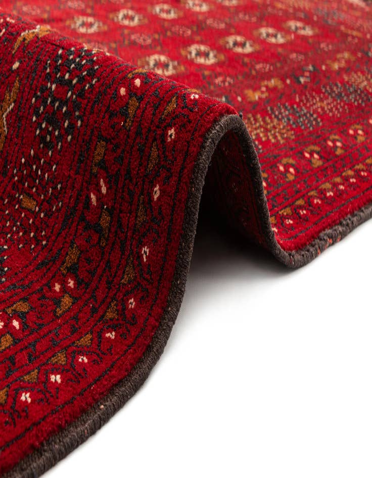 Detail image of  4' 1 x 6' 4  Hand Knotted Afghan Akhche Wool Rug