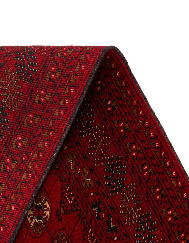 Detail image of  4' 1 x 6' 4  Hand Knotted Afghan Akhche Wool Rug