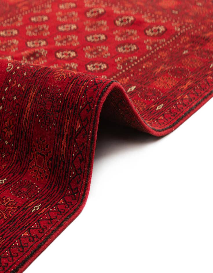 Detail image of  4' 1 x 6' 3  Hand Knotted Afghan Akhche Wool Rug