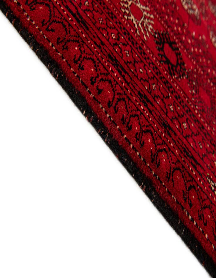 Detail image of  4' 2 x 6' 5  Hand Knotted Afghan Akhche Wool Rug