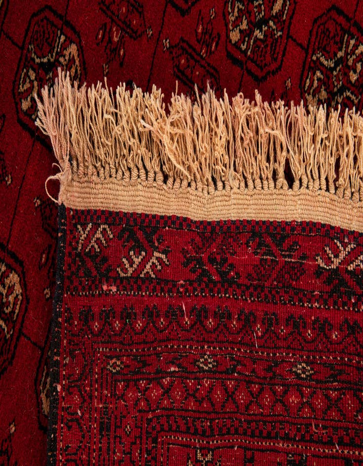 Detail image of  4' 2 x 6' 5  Hand Knotted Afghan Akhche Wool Rug