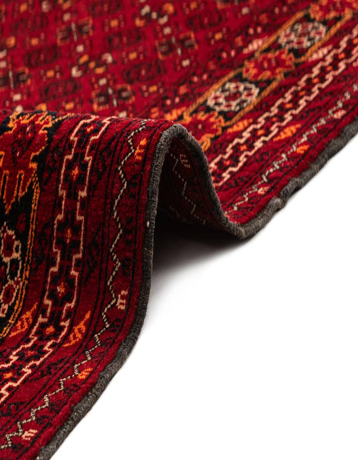 Detail image of  4' 1 x 6' 9  Hand Knotted Afghan Akhche Wool Rug