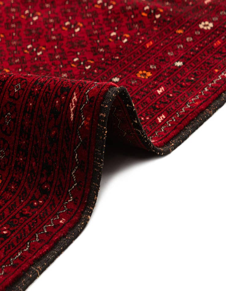 Detail image of  4' 3 x 6' 6  Hand Knotted Afghan Akhche Oriental Wool Rug