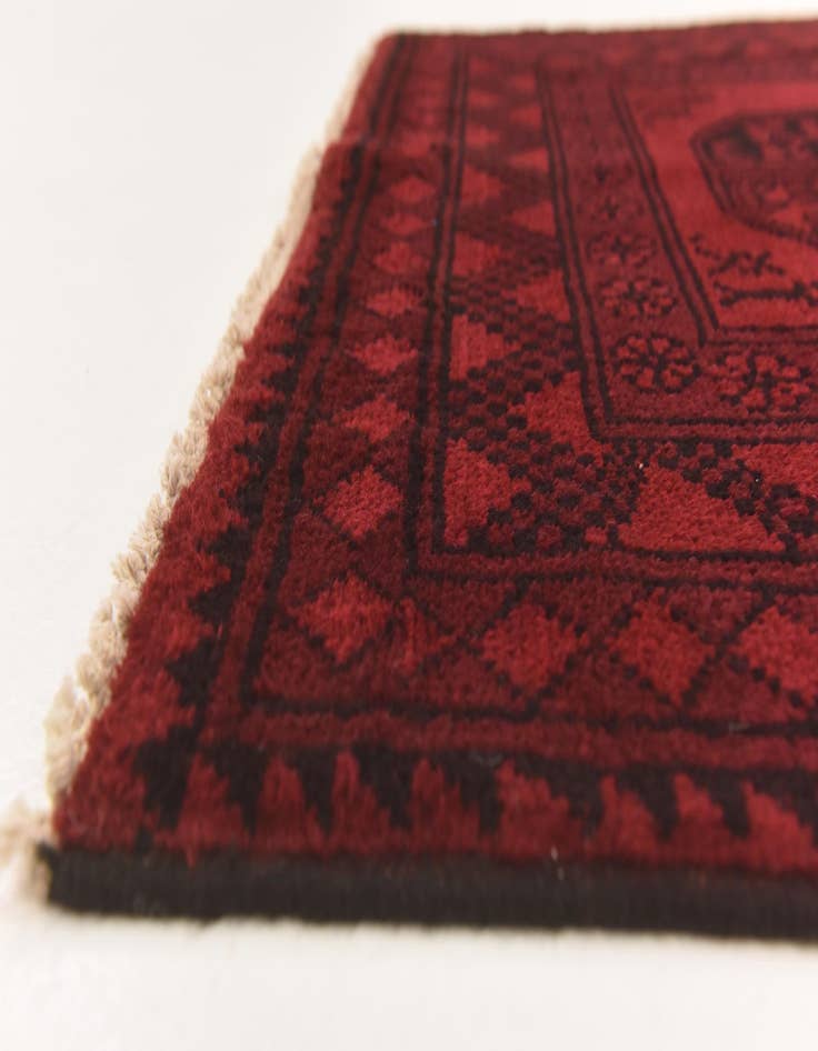 Detail image of  3' 4 x 4' 10  Hand Knotted Afghan Akhche Wool Rug