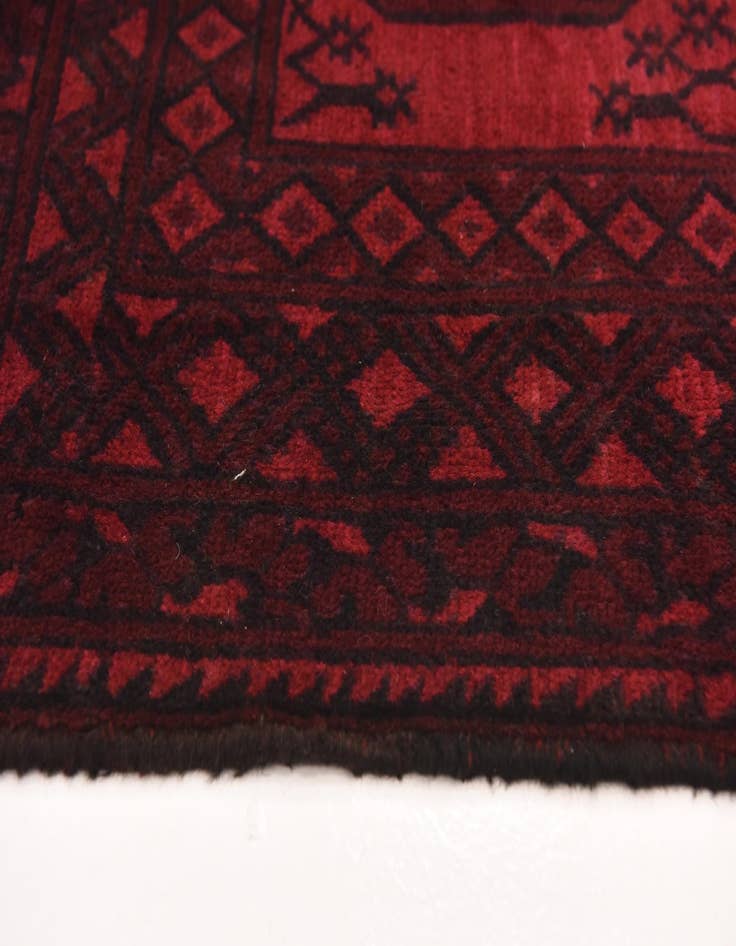 Detail image of  4' 11 x 6' 5  Hand Knotted Afghan Akhche Wool Rug