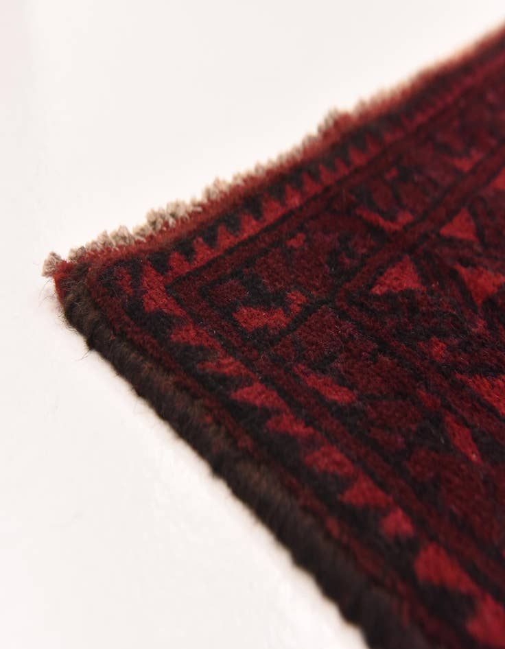 Detail image of  4' 11 x 6' 5  Hand Knotted Afghan Akhche Wool Rug