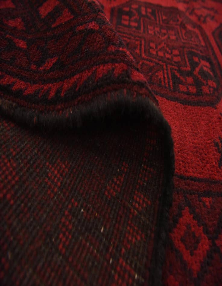 Detail image of  4' 11 x 6' 5  Hand Knotted Afghan Akhche Wool Rug