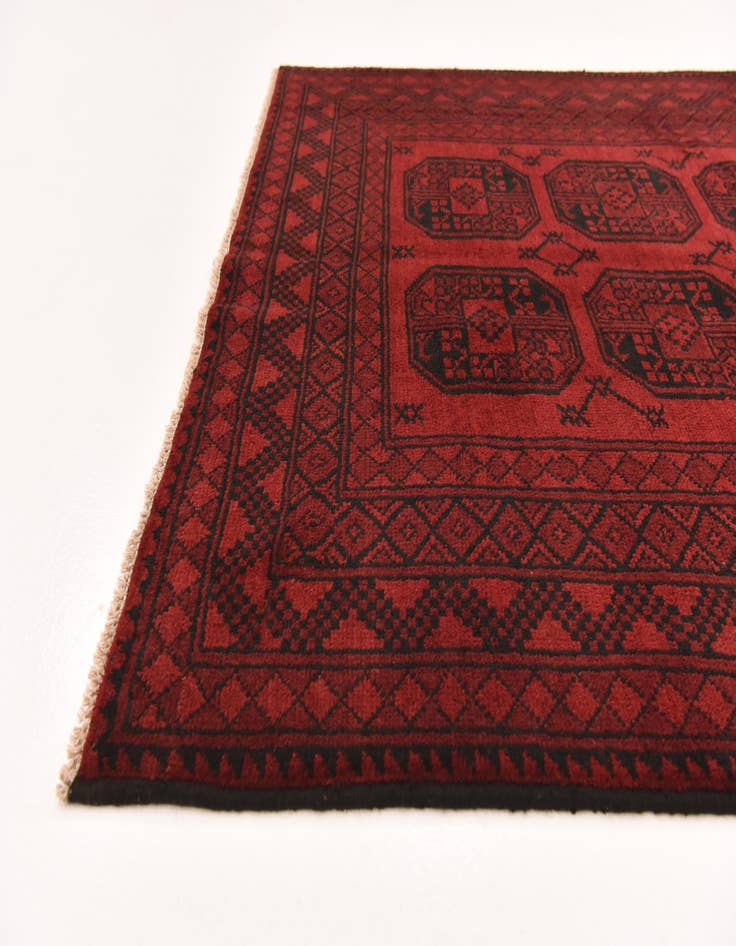 Detail image of  4' 11 x 6' 4  Hand Knotted Afghan Akhche Wool Rug
