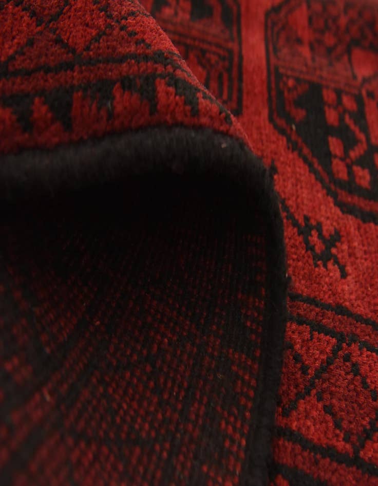 Detail image of  4' 11 x 6' 4  Hand Knotted Afghan Akhche Wool Rug