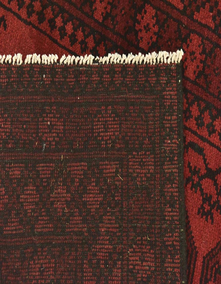 Detail image of  4' 9 x 6' 3  Hand Knotted Afghan Akhche Wool Rug