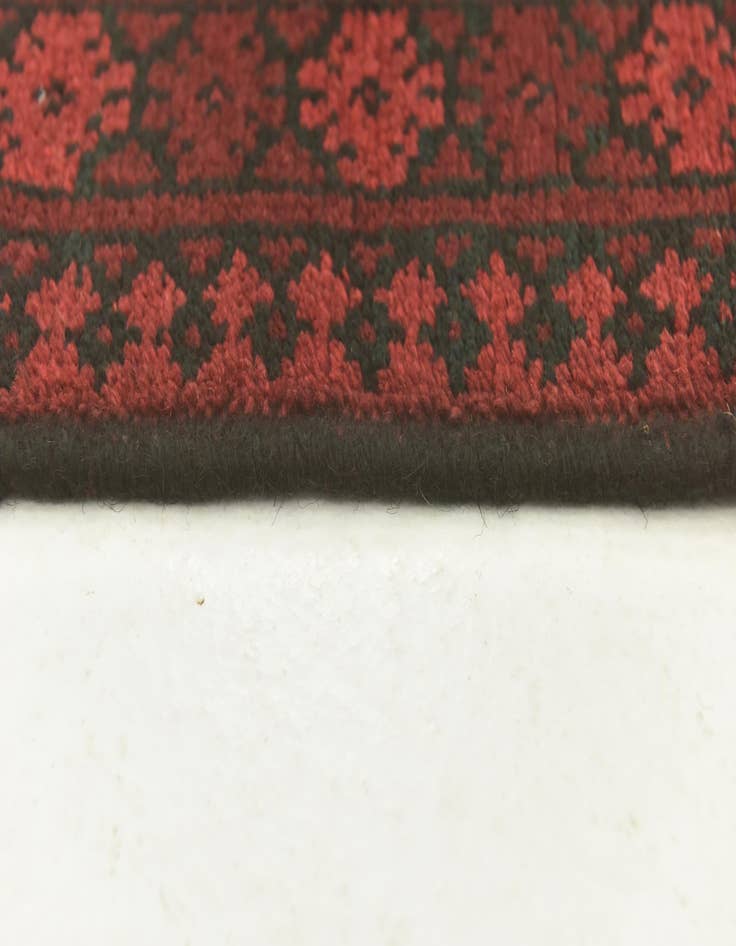 Detail image of  4' 9 x 6' 3  Hand Knotted Afghan Akhche Wool Rug