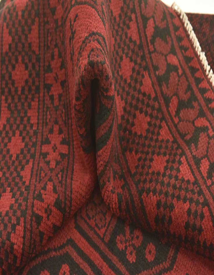 Detail image of  4' 9 x 6' 4  Hand Knotted Afghan Akhche Wool Rug