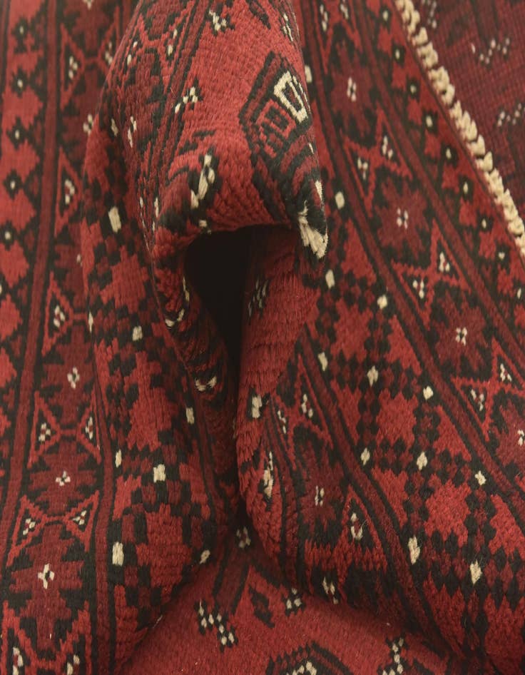 Detail image of  4' 10 x 6' 5  Hand Knotted Afghan Akhche Wool Rug