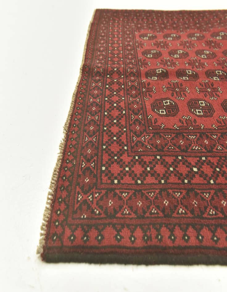 Detail image of  4' 10 x 6' 5  Hand Knotted Afghan Akhche Wool Rug