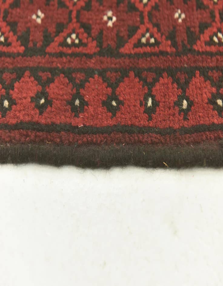 Detail image of  4' 10 x 6' 5  Hand Knotted Afghan Akhche Wool Rug
