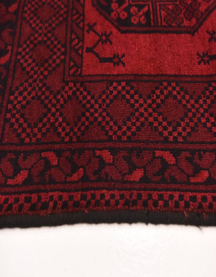 Detail image of  4' 11 x 6' 6  Hand Knotted Afghan Akhche Wool Rug