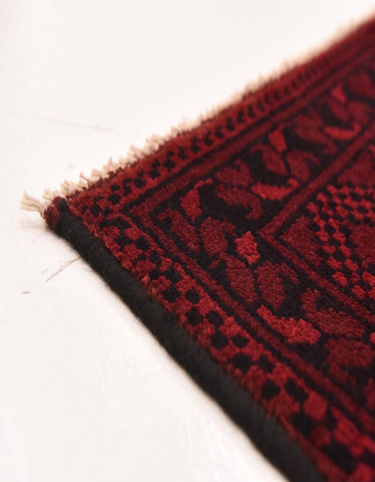 Detail image of  4' 11 x 6' 6  Hand Knotted Afghan Akhche Wool Rug