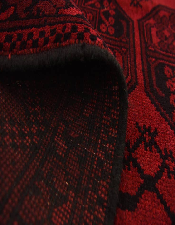 Detail image of  4' 11 x 6' 6  Hand Knotted Afghan Akhche Wool Rug