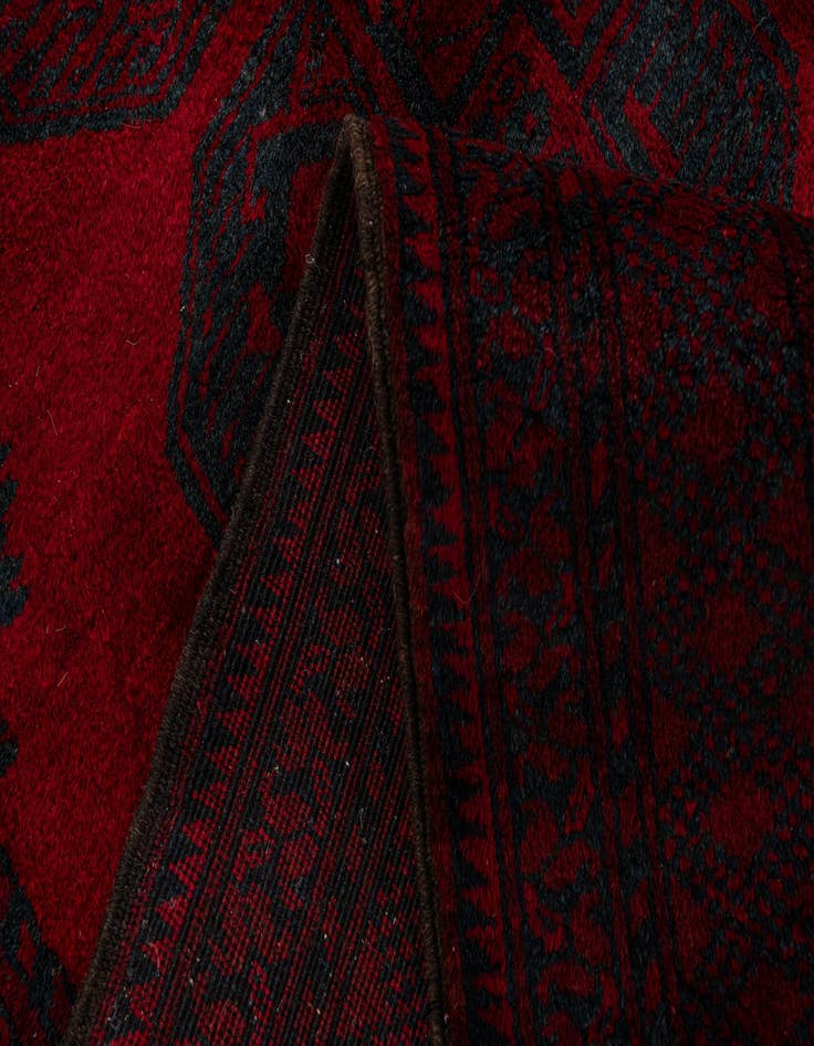 Detail image of  4' 5 x 7' 7  Hand Knotted Afghan Akhche Oriental Wool Rug