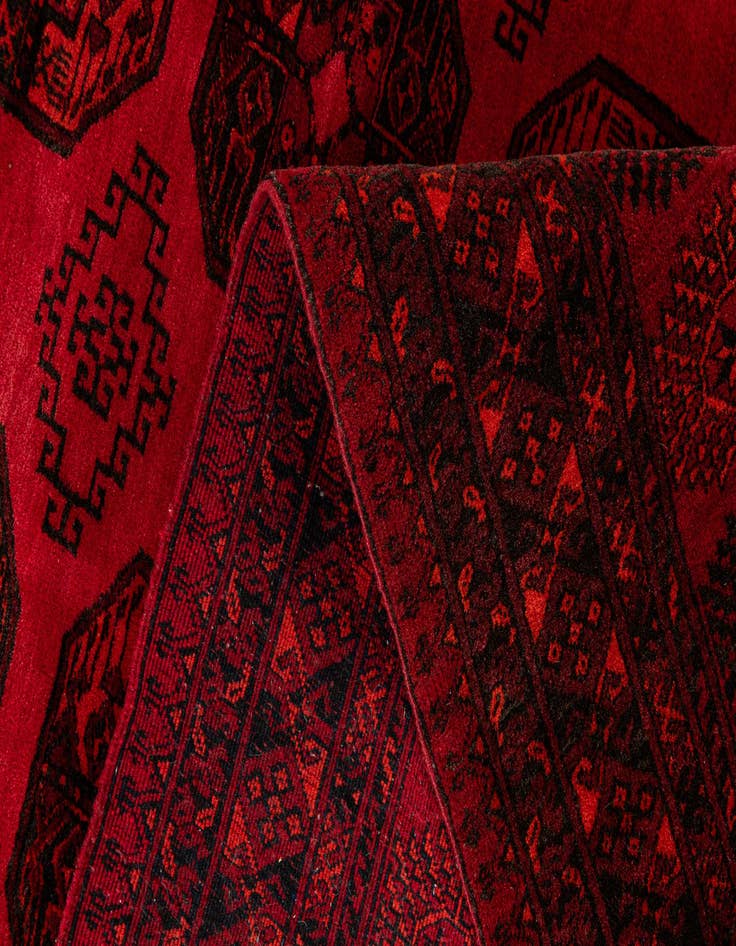 Detail image of  7' x 9' 6  Hand Knotted Afghan Akhche Wool Rug