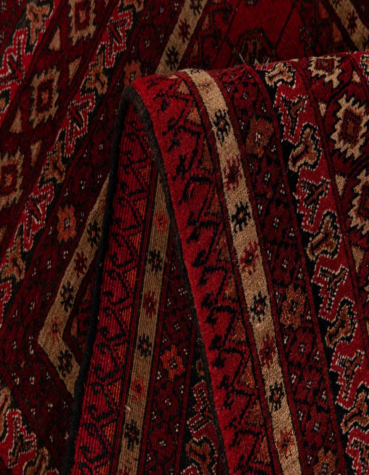 Detail image of  3' 7 x 5' 11  Hand Knotted Afghan Akhche Wool Rug