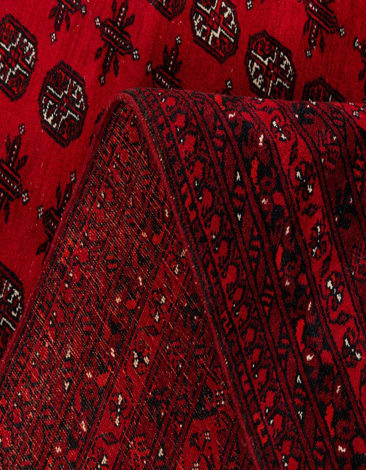 Detail image of  8' 4 x 11' 4  Hand Knotted Afghan Akhche Wool Rug