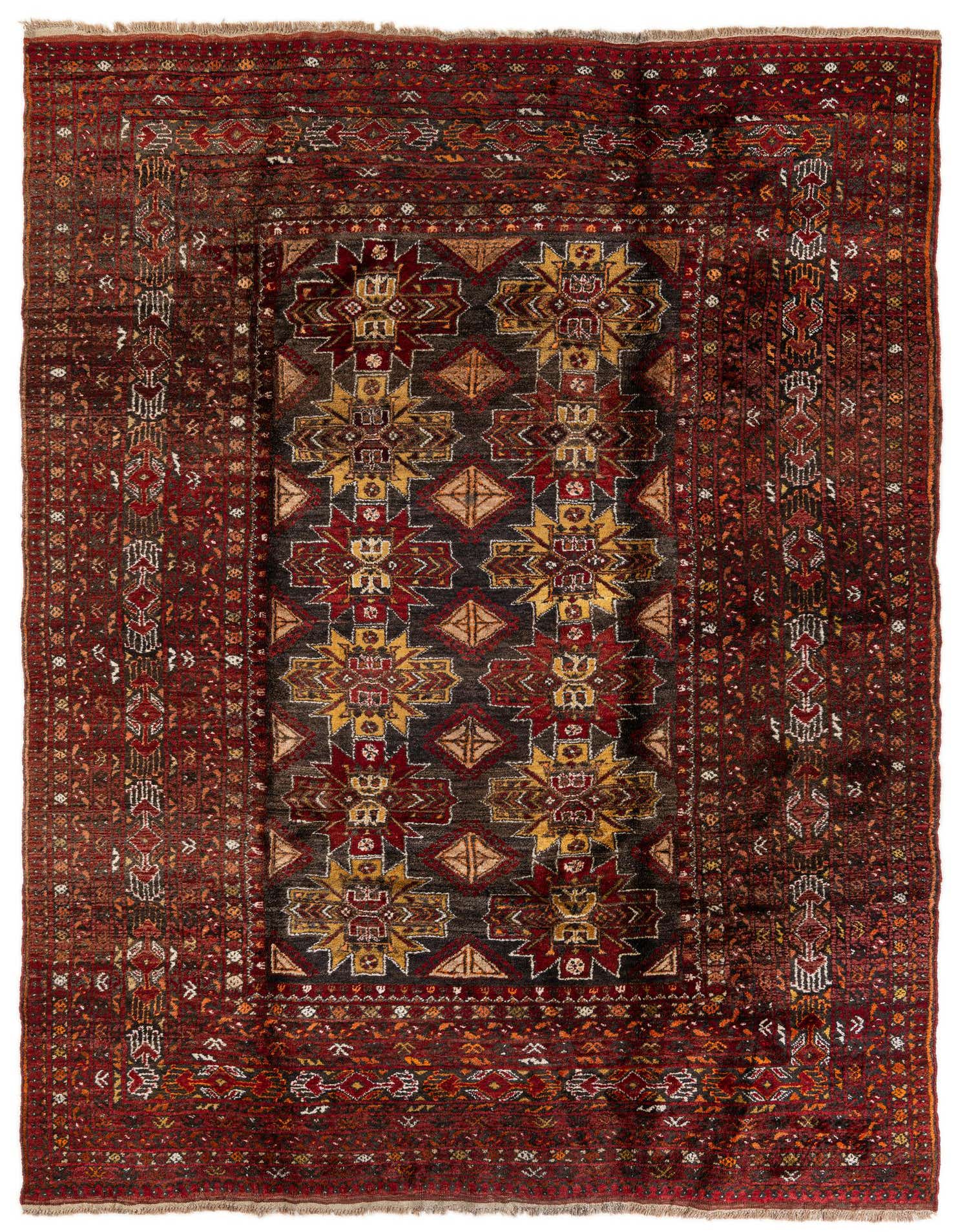 A 7x10 rectangular Afghan Akhche wool rug in traditional tribal pattern with deep reds, gold, and dark accents.