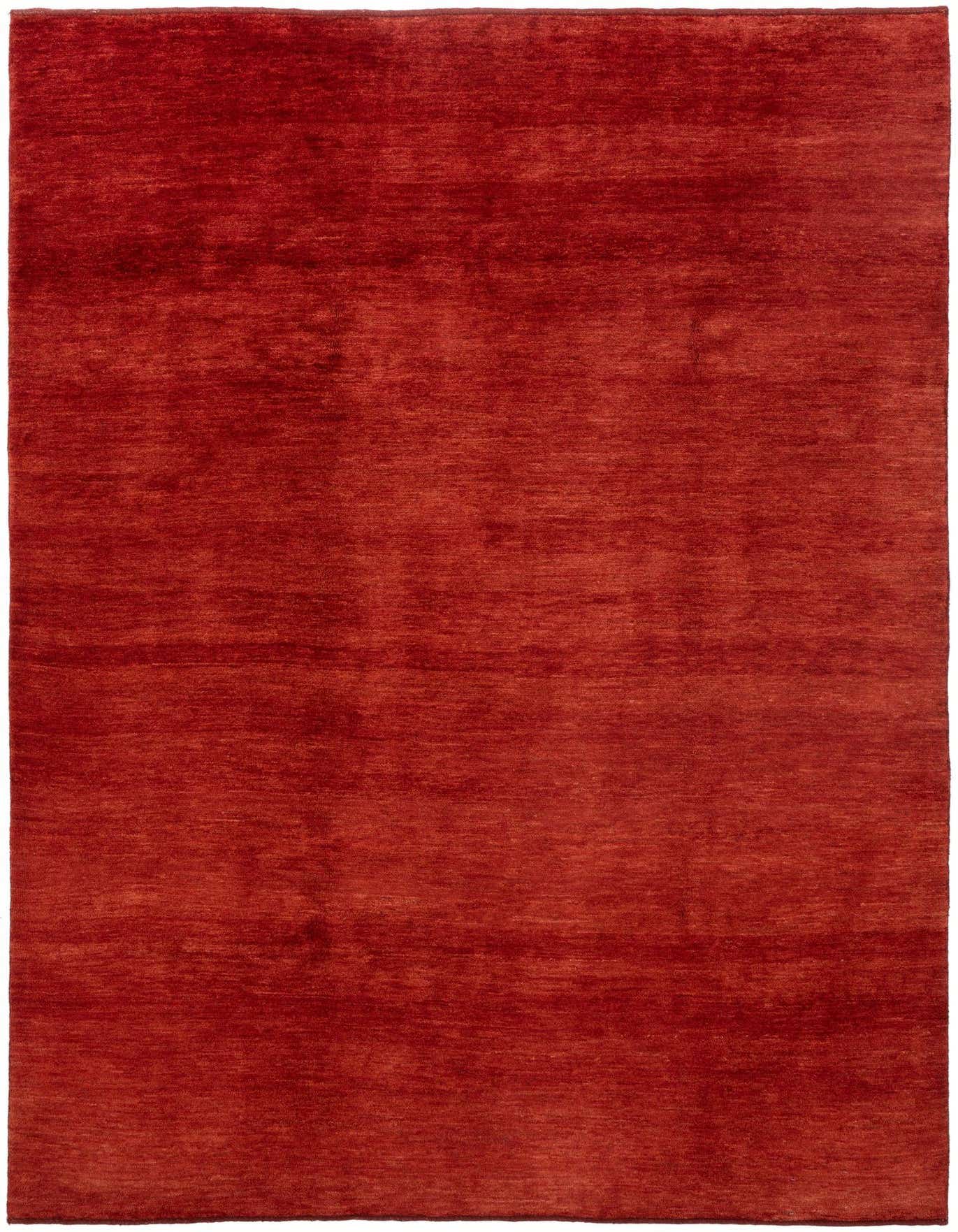 A 6x9 rectangular Amaleh Persian rug in deep red, featuring a subtle, variegated texture.