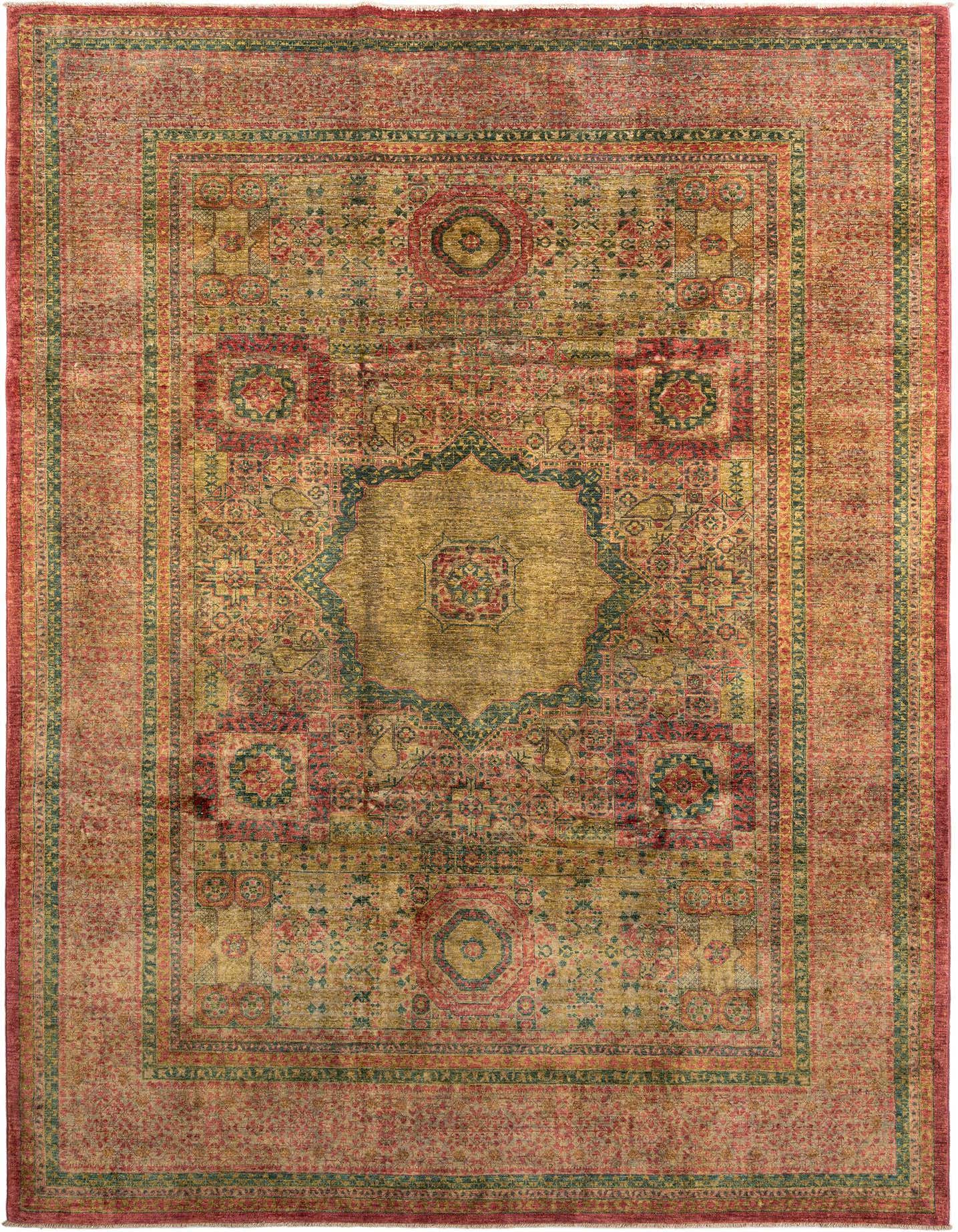A rectangular handmade Persian rug featuring a distressed traditional pattern in reds, gold, and teal, suitable for an indoor living space.