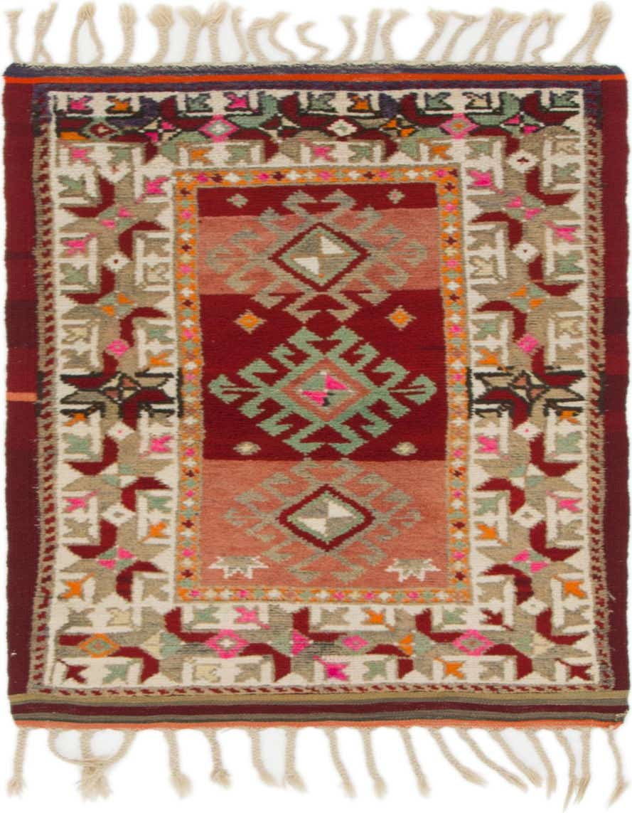 A 3x4 rectangular Anatolian wool rug featuring a traditional tribal medallion pattern in various shades of red, beige, and accent colors.