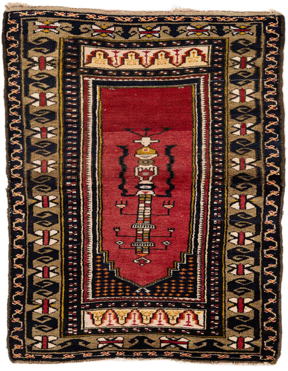 A 3x5 rectangular Anatolian rug with a deep red field, black borders, and traditional medallion patterns.