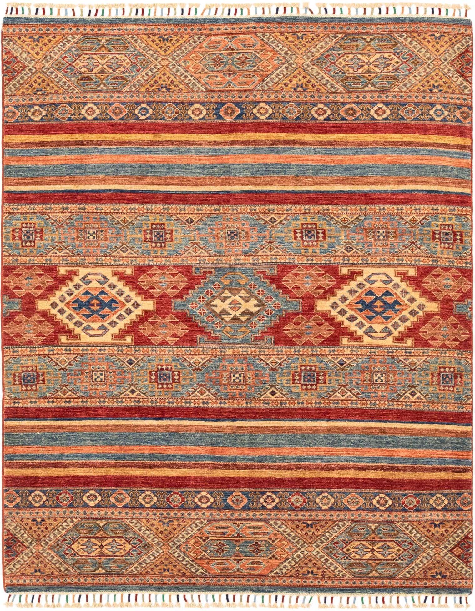 A 4x6 rectangular Ariana Ziegler rug featuring a Southwestern and Tribal pattern in rich reds, blues, and gold tones with fringe.
