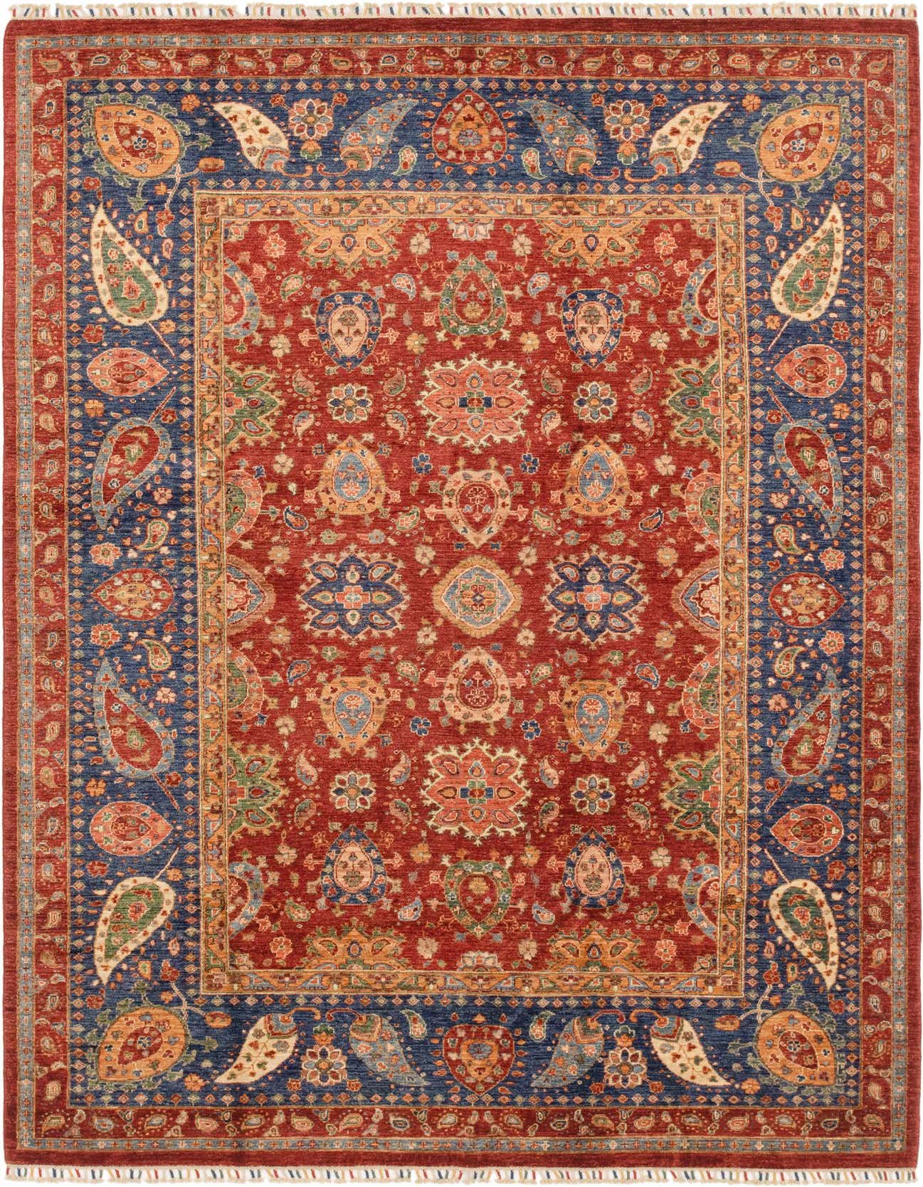 A 7x10 rectangular Ariana Ziegler rug featuring a rich red field with intricate floral and medallion patterns, framed by a wide navy blue border with large paisley motifs.