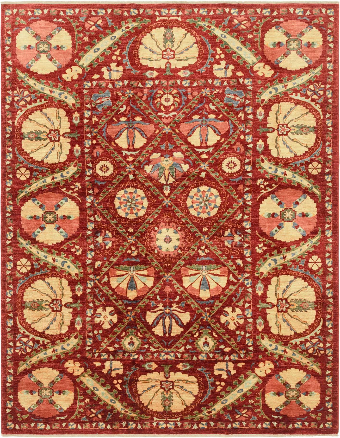 A 7x10 rectangular Ariana Ziegler rug featuring a traditional tribal pattern in reds, creams, and blues.
