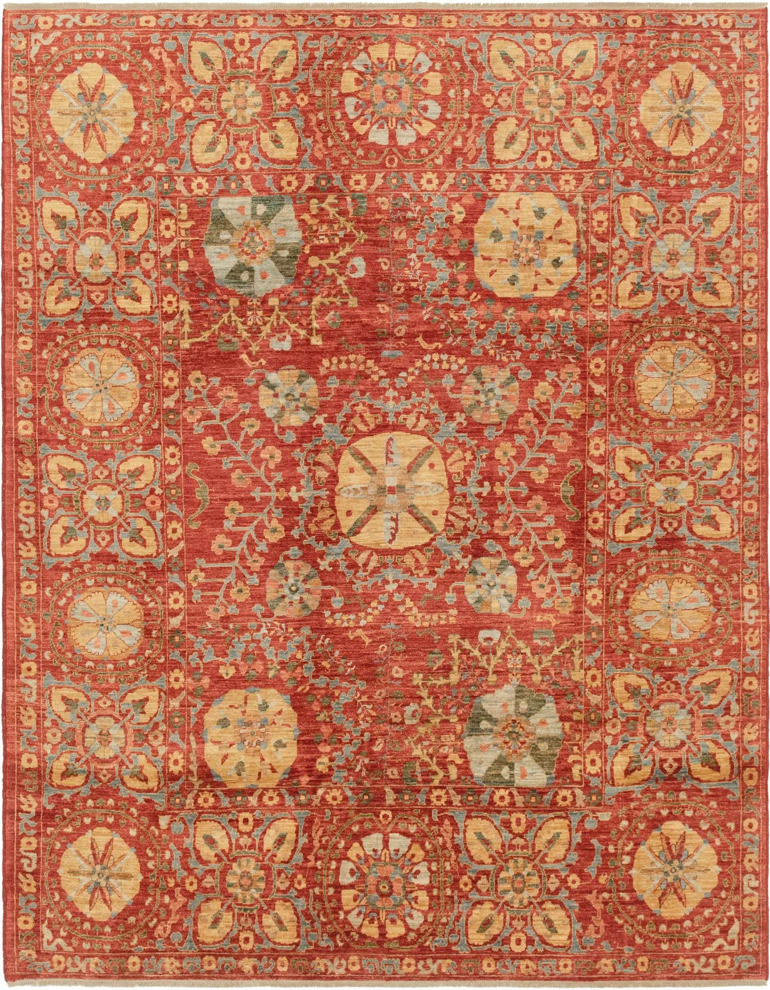 A 6x9 rectangular Ariana Ziegler rug featuring a traditional tribal pattern in rich reds, gold, and light blue.